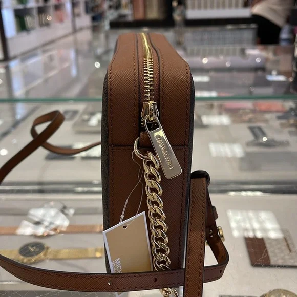 MICHAEL KORS
Jet Set Large East West Zip Printed Logo Crossbody Bag
Brown 
NWT - Picture 7 of 16